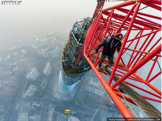 the-pair-also-climbed-650-meters-2130-ft-to-the-top-of-one-of-chinas-tallest-skyscrapers-the-shanghai-tower-three-elevators-send-passengers-up-to-the-sightseeing-platform-but-the-photographers-decided-1