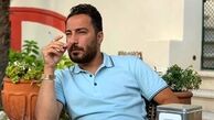 چهره جدی نوید محمدزاده در حال سیگار کشیدن + عکس