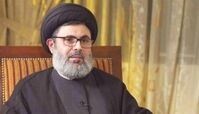 ببیند | پیکر شهید سید هاشم صفی‌ الدین در حال آماده شدن برای خاکسپاری