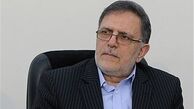 شعارهای متقاضیان مسکن مهر در نمایشگاه مطبوعات/سیف بازدید نمایشگاه را نیمه کاره رها کرد