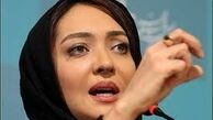 نیکی کریمی در حال تماشای بازی بیس بال