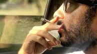 سیگار کشیدن نوید محمدزاده در ماشین + عکس