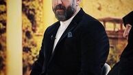 کودکی علی انصاریان در آغوش پدر