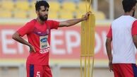 نمایش پیراهن هافبک پرسپولیس در بازی عربستان - عراق + عکس