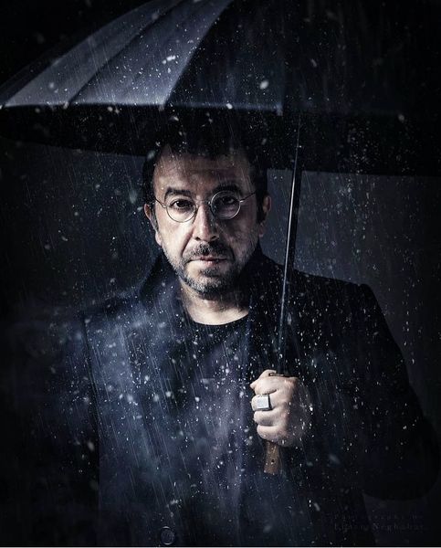 محمدرضا مالکی در باران + عکس