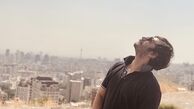 عباس غزالی بر فراز تهران + عکی