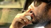 سیگار کشیدن نوید محمدزاده در ماشینش + عکس